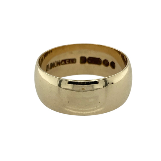 Bring bold elegance and timeless tradition to your collection with this pre-owned 9ct yellow gold wedding band ring, a substantial design perfect for marking life’s most important moments.

Design: The ring features a wide 8mm band, offering a strong and distinguished profile.
Material: Made from 9-carat yellow gold, the polished finish enhances the band’s warm tone and refined appearance.