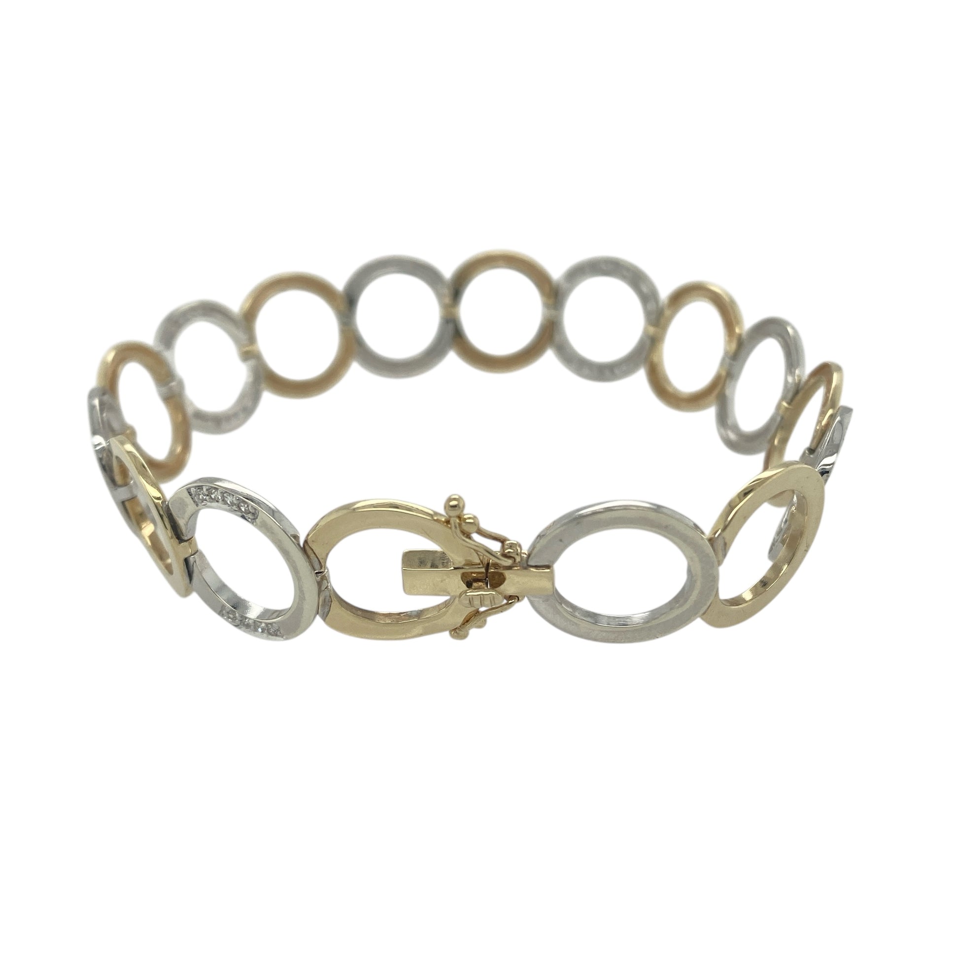 Bring bold elegance and refined sparkle to your collection with this pre-owned 9ct yellow and white gold diamond circle link bracelet, a striking design perfect for statement wear.

Design: The bracelet measures 7.75" in length with 14mm wide circular links, each accented with diamonds to create a luxurious and eye-catching finish.
Material: Made from 9-carat yellow and white gold, the polished surfaces enhance the contrast between the two tones while highlighting the brilliance of the diamonds.