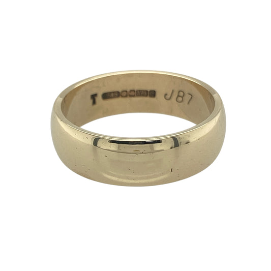 Bring bold elegance and timeless tradition to your collection with this pre-owned 9ct yellow gold wedding band ring, a substantial design perfect for marking life’s most important moments.

Design: The ring features a wide 7mm band, offering a strong and distinguished profile.
Material: Made from 9-carat yellow gold, the polished finish enhances the warm tone of the gold with a refined glow.