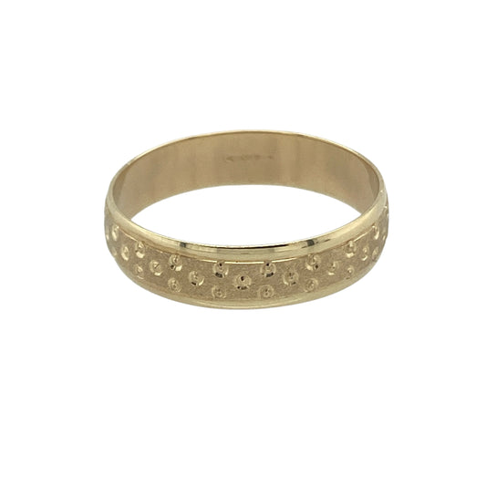 Bring playful detail and subtle charm to your collection with this pre-owned 9ct yellow gold spotty patterned band ring, a light and stylish design for everyday wear.

Design: The ring features a 4mm wide band decorated with a spotty pattern, creating a fun and distinctive look.
Material: Made from 9-carat yellow gold, the polished finish enhances the textured design while adding warmth and shine.