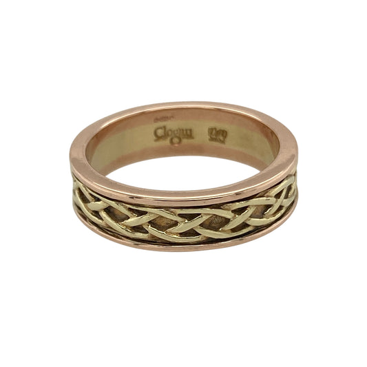 Bring heritage, elegance, and timeless craftsmanship to your collection with this pre-owned 9ct yellow and rose gold Clogau Celtic weave band ring—a beautifully symbolic design inspired by Welsh tradition.

Design: The ring features Clogau’s signature Celtic weave pattern, intertwining strands of yellow and rose gold that represent eternity, unity, and everlasting love. The intricate detailing creates a graceful and meaningful design.