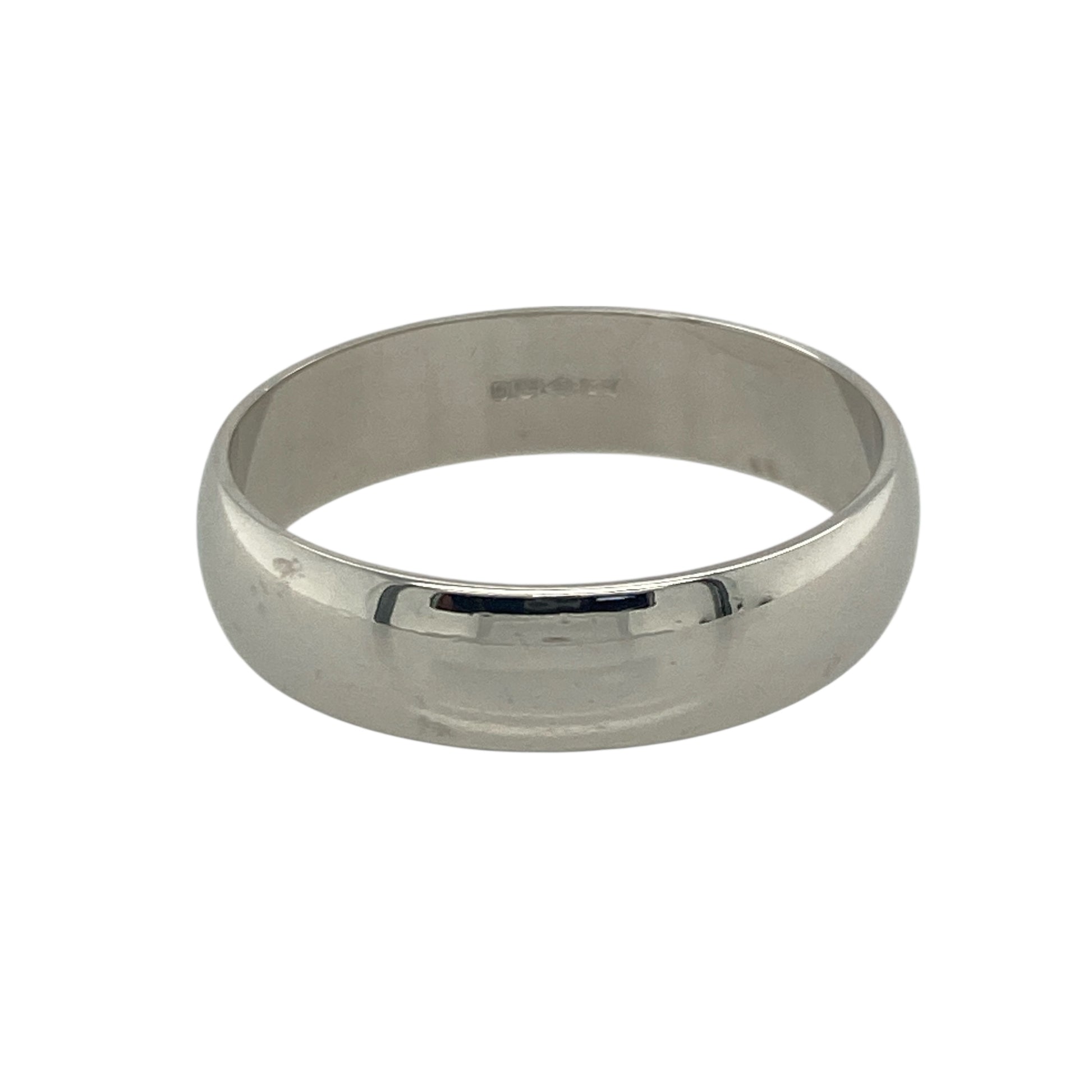 Bring timeless elegance and enduring quality to your collection with this pre-owned platinum 5mm wedding band ring—perfect as a classic symbol of love or a sophisticated everyday piece.

Design: The ring features a traditional 5mm-wide band with a smooth, polished finish, offering a refined and understated look that never goes out of style.
Material: Made from premium platinum, the metal’s natural white sheen ensures exceptional durability and lasting brilliance, making it ideal for lifelong wear.