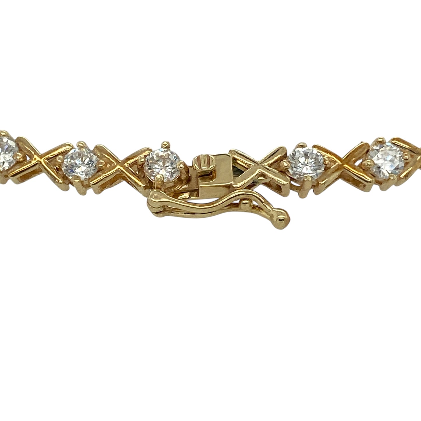 Bring sparkle, elegance, and warm golden shine to your jewellery collection with this pre-owned 9ct yellow gold and cubic zirconia 7" bracelet—an eye-catching piece that blends timeless style with radiant brilliance.

Design: This beautifully arranged bracelet features alternating 3mm cubic zirconia stones and stylish ‘X’ kiss-shaped links, creating a flowing pattern that catches the light with every movement. The combination of sparkle and polished gold offers a refined yet contemporary look.