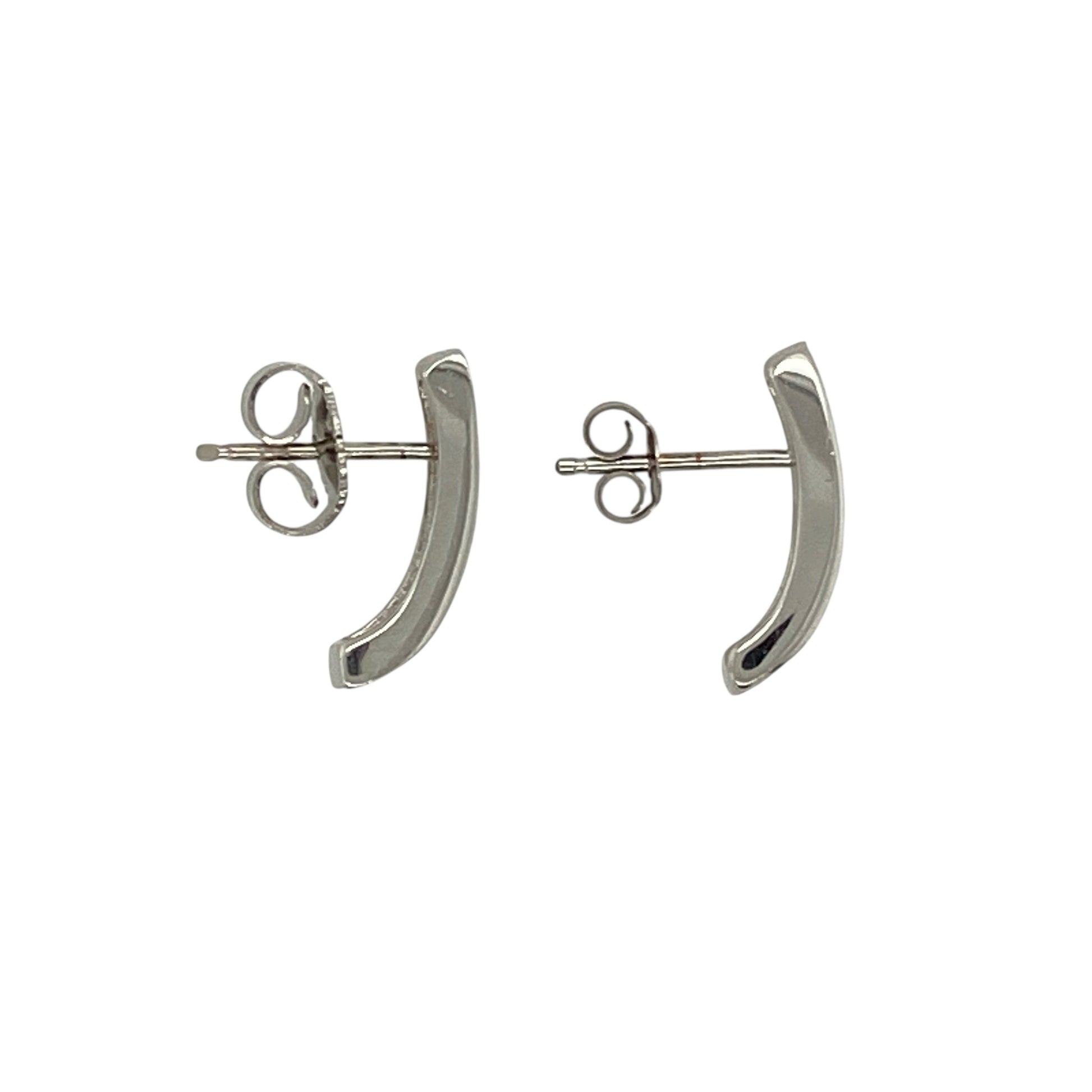 Bring sleek sophistication and subtle sparkle to your jewellery collection with this pre-owned 9ct white gold diamond set curved bar stud earrings, a refined pair perfect for everyday elegance.

Design: These stud earrings feature a gently curved bar design accented with diamond detailing, offering a modern and minimalist look with a touch of brilliance.
Material: Made from 9-carat white gold, the bright polished finish enhances the diamonds’ sparkle and gives the earrings a clean, contemporary appeal.