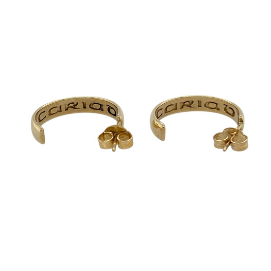 Bring romantic symbolism and signature Welsh style to your jewellery collection with these pre-owned 9ct yellow gold Clogau Cariad half hoop stud earrings.

Design: The earrings feature the elegant Cariad (meaning “love”) half hoop design, offering a refined and timeless look that sits beautifully on the ear.
Material: Made from 9-carat yellow gold, the warm polished finish highlights the classic curves and understated elegance of the design.