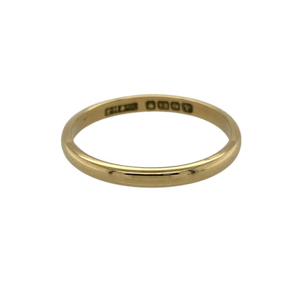 Bring timeless simplicity and classic elegance to your jewellery collection with this pre-owned 18ct yellow gold wedding band ring.

Design: The ring features a traditional plain band profile with a slim 2mm width, offering a clean and understated look that never goes out of style.
Material: Made from rich 18-carat yellow gold, the warm polished finish gives the ring a luxurious tone and enduring appeal.