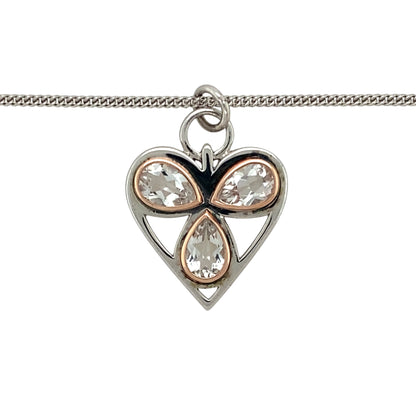 Preowned 925 Silver with 9ct Rose Gold Clogau & White Topaz Set Clogau Heart Pendant on an 18" - 22" Clogau curb chain with the weight 8.20 grams. The pendant is 2.9cm long including the bail