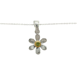 Add a touch of elegance and personal meaning to your jewellery collection with this new 925 silver & peridot set flower August birthstone pendant necklace, featuring:

Design: A delicate flower-shaped pendant, set with a vibrant peridot birthstone at its centre for a timeless and meaningful touch.
Material: 925 sterling silver, with a gold-plated setting around the peridot for added warmth and contrast.
Gemstone: Features a 2mm diameter peridot, known as the birthstone for August, symbolising strength and p