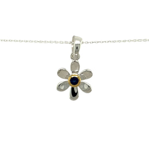 Add a touch of elegance and personal meaning to your jewellery collection with this new 925 silver & sapphire set flower September birthstone pendant necklace, featuring:

Design: A delicate flower-shaped pendant, set with a deep blue sapphire birthstone at its centre for a timeless and meaningful touch.
Material: 925 sterling silver, with a gold-plated setting around the sapphire for added warmth and contrast.
Gemstone: Features a 2mm diameter sapphire, known as the birthstone for September
