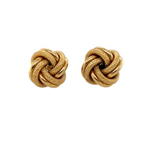 Load image into Gallery viewer, Add a touch of elegance and texture to your jewellery collection with these pre-owned 9ct yellow gold 15mm patterned knot stud earrings, featuring:

Design: Classic knot-shaped stud earrings with an intricate patterned finish, adding depth and sophistication.
Material: 9-carat yellow gold, offering a warm and timeless appeal.
Size: Measures 15mm in diameter, making them a noticeable yet refined accessory.
Weight: A solid 3 grams, ensuring durability while remaining comfortable for everyday wear.

