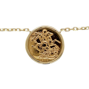 Add a luxurious and historic piece to your jewellery collection with this pre-owned 9ct yellow gold full sovereign mount pendant necklace, featuring:

Design: A classic full sovereign mount pendant, securely holding a genuine 1910 Edward VII full sovereign coin.
Material: The mount and chain are made from 9-carat yellow gold, while the sovereign coin is 22-carat gold, adding richness and value.
Coin Details: Features an Edward VII full sovereign from 1910, a collectible piece with historical significance.
