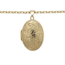 Load image into Gallery viewer, Add a sentimental and timeless piece to your jewellery collection with this pre-owned 9ct yellow gold patterned oval locket pendant necklace, featuring:

Design: A classic oval locket with intricate patterned detailing, perfect for holding cherished photos or keepsakes.
Material: 9-carat yellow gold, offering a rich and polished finish.
Pendant Size: Measures 3.4cm long including the bail, making it an elegant and eye-catching feature.

