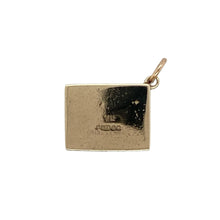 Load image into Gallery viewer, Add nostalgic charm and playful detail to your collection with this pre-owned 9ct yellow gold vintage 10 shilling note case charm—full of character and classic novelty appeal.

Design: The charm is crafted in the shape of a folded case, traditionally designed to hold a miniature 10 shilling note. Engraved on the bottom is the witty phrase “In emergency break glass”, adding vintage humour and charm.
Material: Made from 9-carat yellow gold
