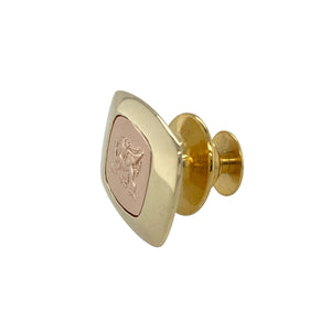Bring proud symbolism and refined detail to your collection with this pre-owned 9ct yellow and rose gold Clogau Welsh Dragon tie pin—a distinguished accessory with heritage appeal.

Design: This tie pin features the iconic Welsh Dragon in intricate detail, offering a bold and elegant accent with timeless character.
Material: Made from 9-carat yellow and rose gold, the warm tones highlight the raised dragon design and reflect Clogau’s signature Welsh gold styling.
