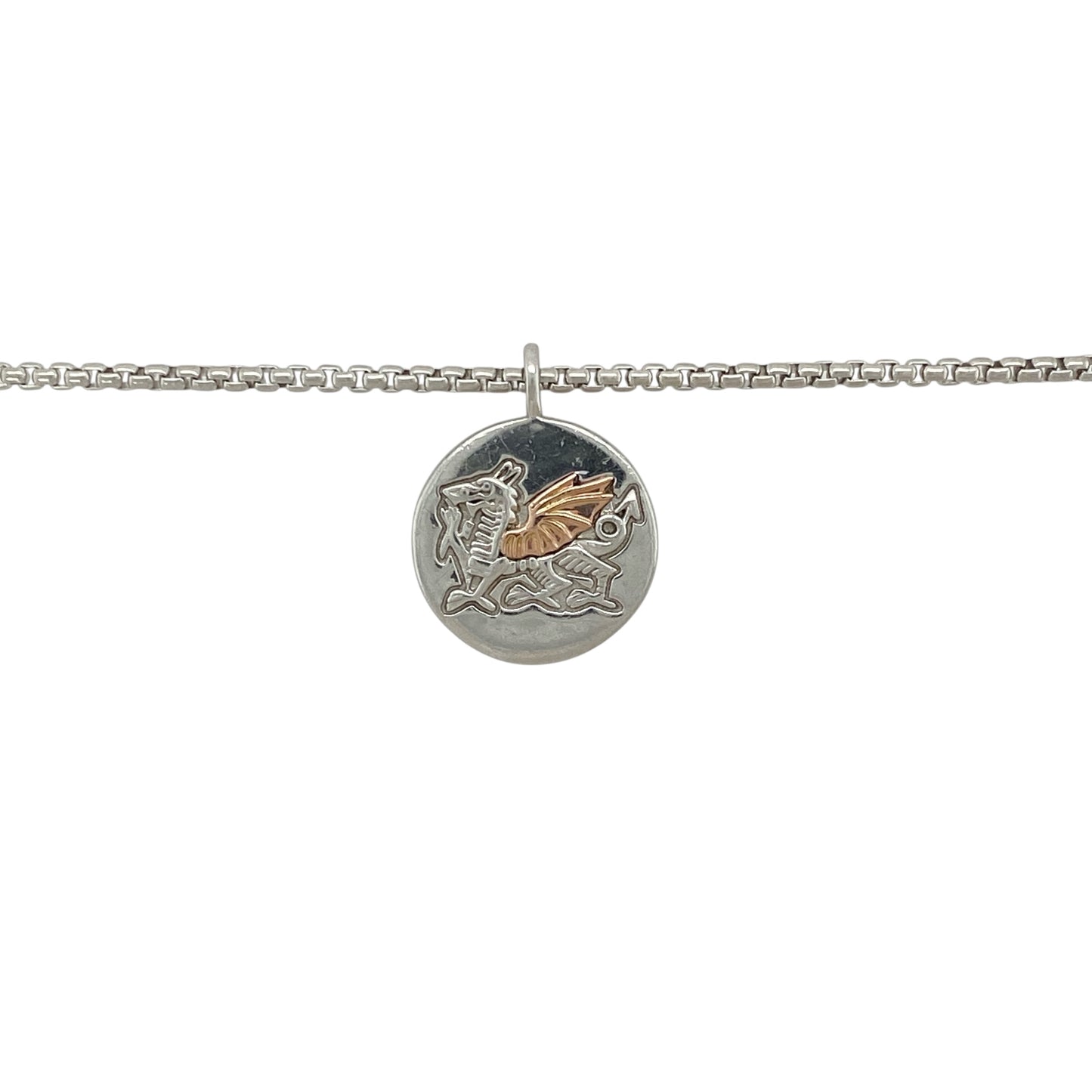 Bold in meaning and crafted with pride, this pre-owned Clogau necklace features the iconic WRU Welsh Dragon emblem—perfect for supporters, collectors, or as a symbol of national heritage.

Design: The necklace features a 2.1cm round pendant (including the bail) with the official Welsh Rugby Union (WRU) Welsh Dragon emblem in 925 silver, accented with 9ct rose gold for added warmth and depth.
