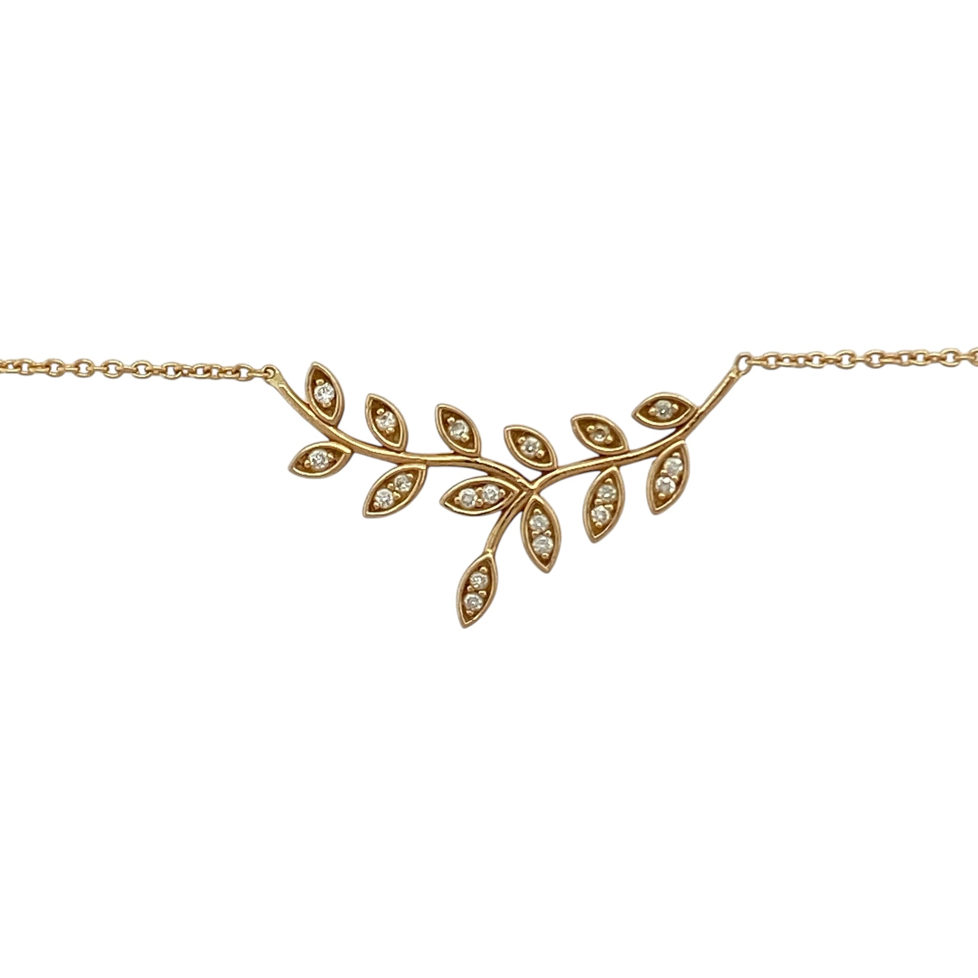 Add natural elegance to your collection with this pre-owned 18ct yellow gold diamond leaf necklace, an adjustable design offering timeless sparkle.

Design: The necklace features a 2.8cm wide leaf motif, delicately accented with diamonds for refined brilliance. It is paired with a 16"–18" adjustable chain for versatile wear.
Material: Made in 18-carat yellow gold, the polished finish enhances the warm tone of the gold and the radiance of the diamonds.