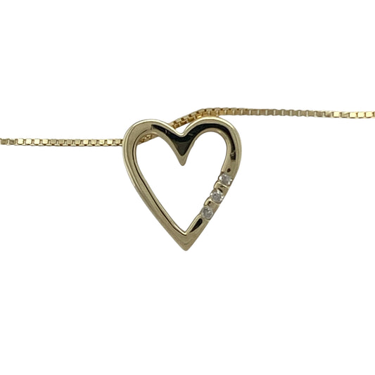 Bring romance, sparkle, and timeless elegance to your collection with this pre-owned 9ct yellow gold diamond open heart pendant on an adjustable 16"–18" box chain necklace—a beautifully symbolic piece representing love and connection.

Design: The pendant features an open heart design adorned with sparkling diamonds that add brilliance and charm to its graceful shape. Measuring approximately 1.5cm long, it captures a perfect balance of sentiment and style.