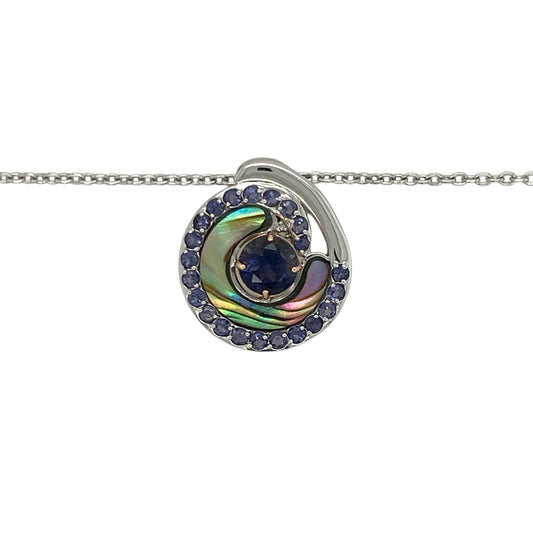 Bring ocean-inspired elegance and soft colour to your collection with this pre-owned 925 silver and 9ct rose gold iolite set Clogau Ebb and Flow Abalones pendant necklace—perfect for adding a touch of natural beauty and sophistication to any outfit.

Design: The 2cm-long pendant features a captivating 6mm round iolite stone at its centre, showcasing deep violet-blue tones reminiscent of the sea.