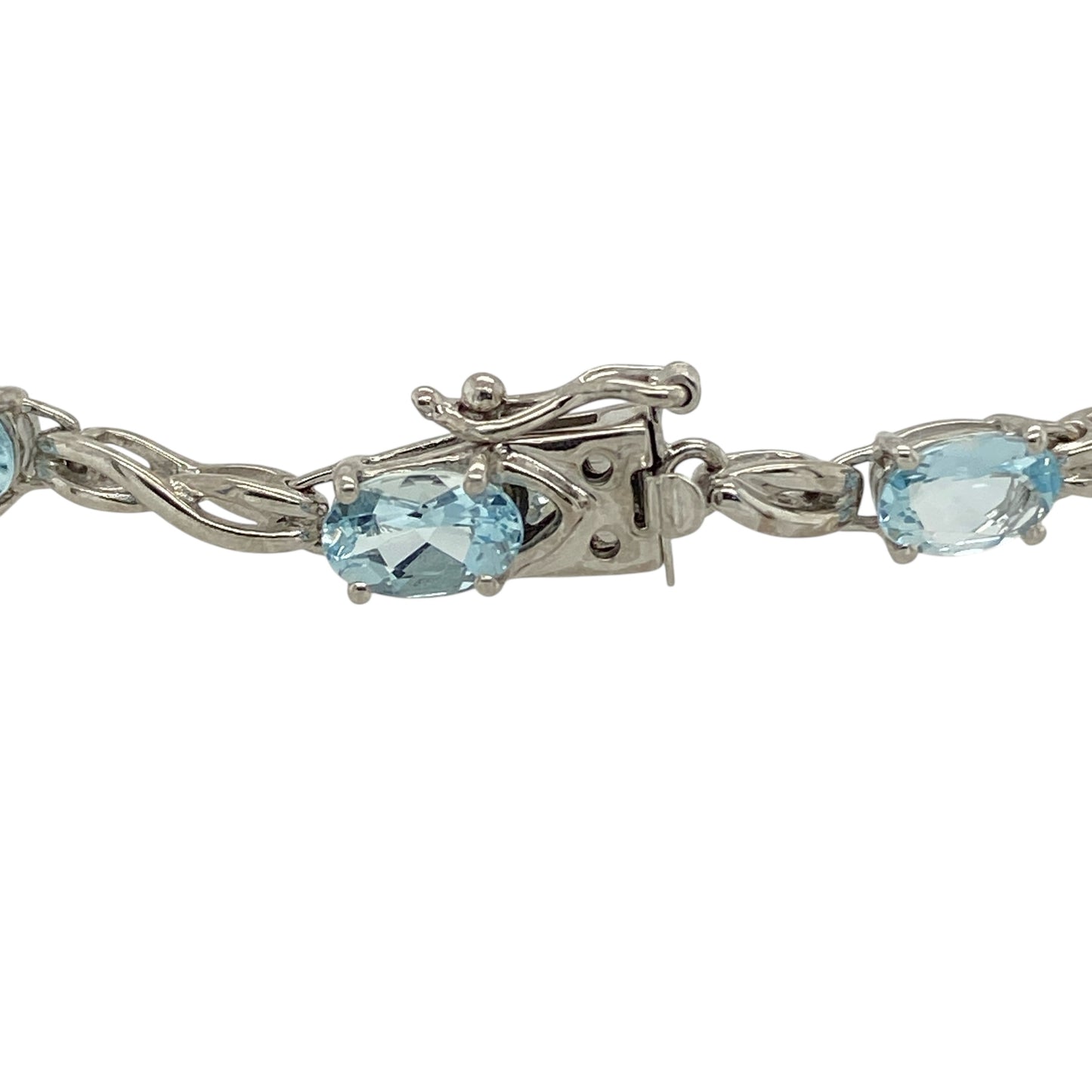 Bring fresh colour and refined elegance to your jewellery collection with this pre-owned 9ct white gold & blue topaz set bracelet, offering timeless style with a graceful finish.

Design: The bracelet features oval blue topaz stones set along its length, creating a delicate and balanced look with soft flashes of light blue colour.
Material: Made from 9-carat white gold, the bright polished finish beautifully complements the cool tones of the blue topaz stones.