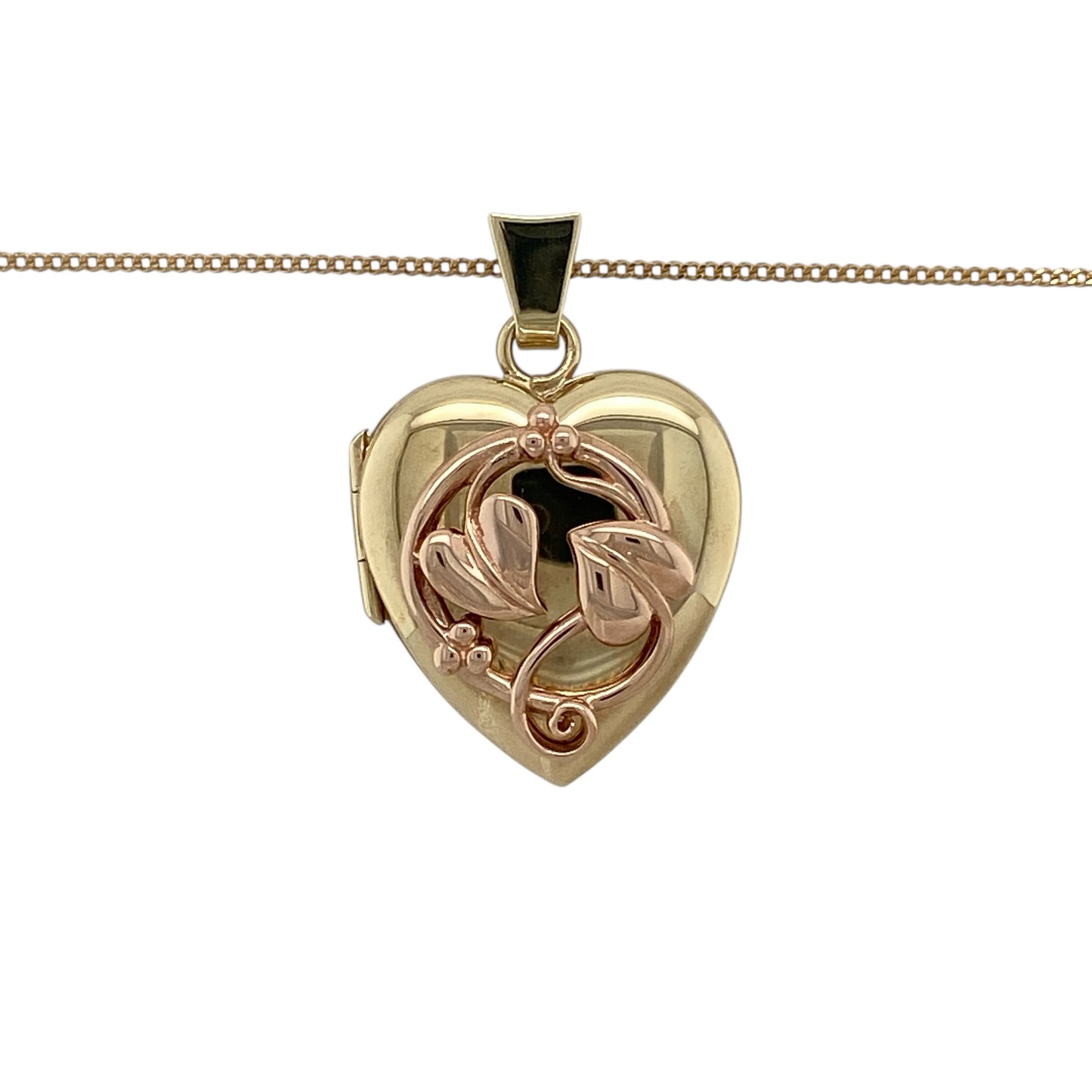 Bring meaningful symbolism and romantic design to your jewellery collection with this pre-owned 9ct yellow and rose gold Clogau Tree of Life heart locket pendant necklace.

Design: The pendant features a heart-shaped locket displaying the iconic Tree of Life motif, symbolising love, strength, and family, with a total length of approximately 3cm including the bail.