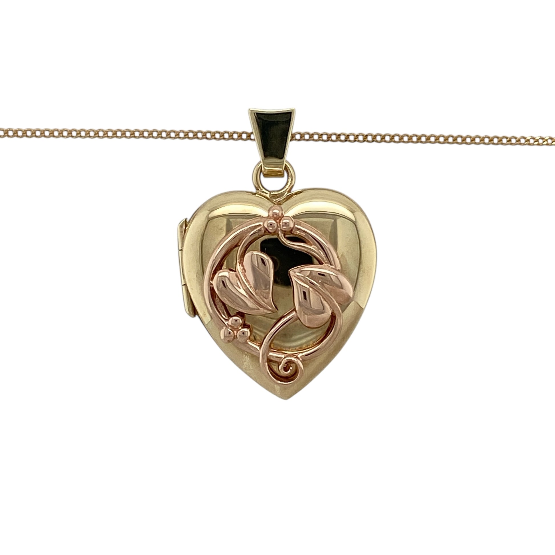 Bring meaningful symbolism and romantic design to your jewellery collection with this pre-owned 9ct yellow and rose gold Clogau Tree of Life heart locket pendant necklace.

Design: The pendant features a heart-shaped locket displaying the iconic Tree of Life motif, symbolising love, strength, and family, with a total length of approximately 3cm including the bail.