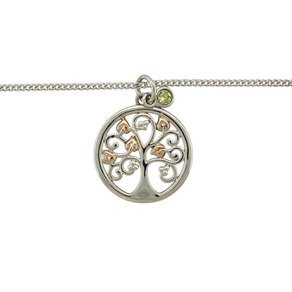 Bring fresh colour and meaningful symbolism to your jewellery collection with this pre-owned 925 silver and 9ct rose gold Clogau Tree of Life pendant necklace.

Design: The pendant features the iconic Tree of Life motif, symbolising growth, strength, and family, accented with a vibrant peridot stone for a touch of natural colour. The pendant measures approximately 2.2cm in length including the bail.