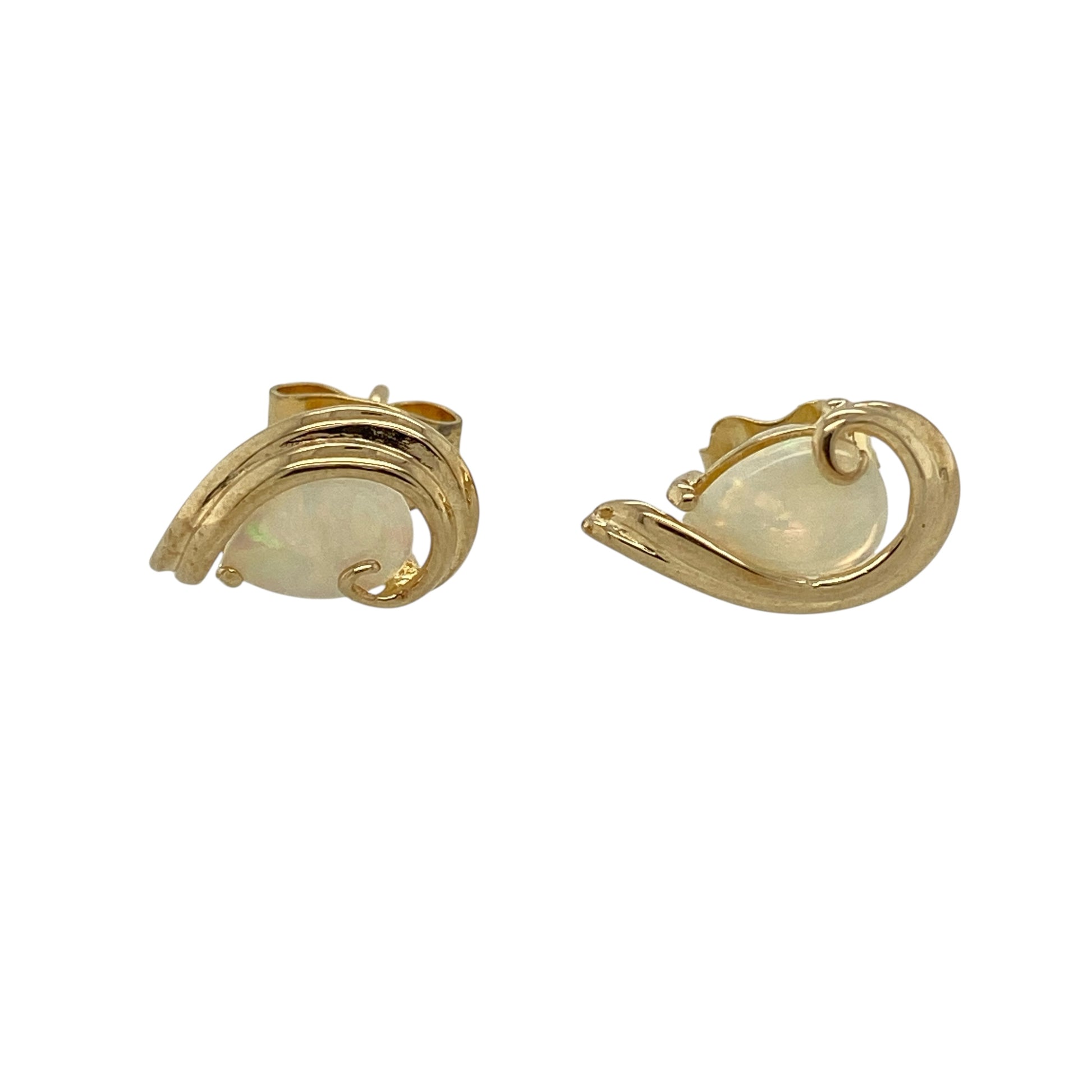 Bring soft iridescence and elegant simplicity to your jewellery collection with these pre-owned 9ct yellow gold and opalique set teardrop stud earrings.

Design: The earrings feature teardrop-shaped opalique stones, each measuring approximately 7mm by 5mm, creating a delicate and eye-catching focal point with a graceful silhouette.
Material: Made from 9-carat yellow gold, the warm polished finish beautifully complements the subtle shimmer and soft tones of the opalique stones.
