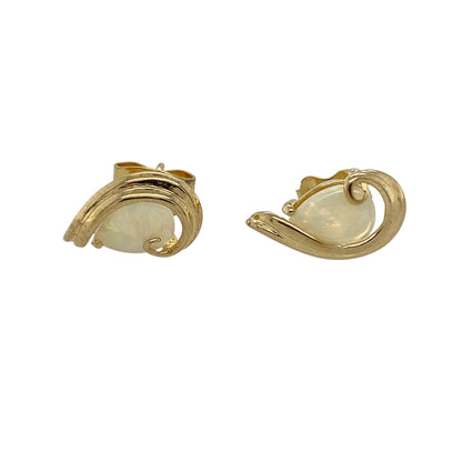 Bring soft iridescence and elegant simplicity to your jewellery collection with these pre-owned 9ct yellow gold and opalique set teardrop stud earrings.

Design: The earrings feature teardrop-shaped opalique stones, each measuring approximately 7mm by 5mm, creating a delicate and eye-catching focal point with a graceful silhouette.
Material: Made from 9-carat yellow gold, the warm polished finish beautifully complements the subtle shimmer and soft tones of the opalique stones.