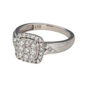 Preowned 9ct White Gold & Diamond Set Illusion Halo Ring in size O with the weight 3.30 grams. The front of the ring is 11mm high and there is approximately 56pt of diamond content in total