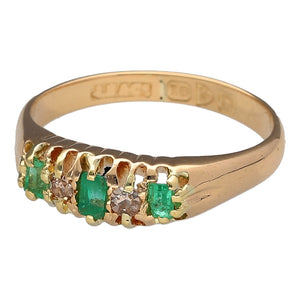 Preowned 18ct Yellow Gold Diamond & Emerald Set Chester Hallmarked Band Ring in size L with the weight 3.40 grams. The center emerald stone is 3mm by 2mm and the side stones are each approximately 2mm by 1.5mm