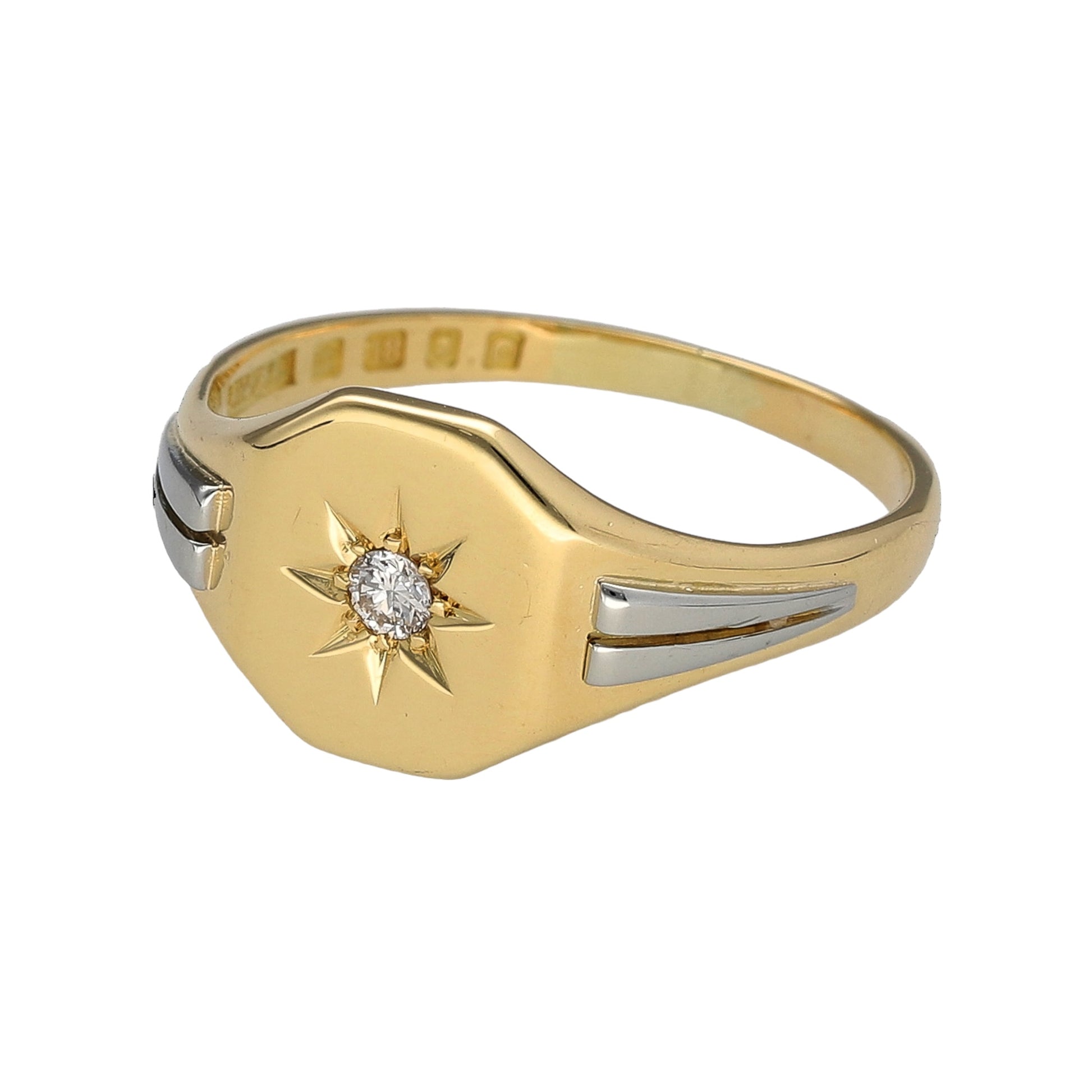 Preowned 18ct Yellow and White Gold & Diamond Set Signet Ring in size U with the weight 6.50 grams. The front of the ring is 11mm high and the diamond is starburst set