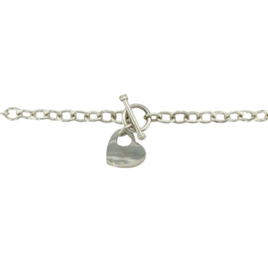 Add bold elegance and timeless style to your collection with this pre-owned 925 silver 16" heart tag T bar chain—a striking piece that combines classic design with a contemporary edge, perfect for making a statement every day or on special occasions.

Design: This necklace features an 8mm wide link chain finished with a polished heart tag and a T bar clasp, creating a distinctive and eye-catching look.
