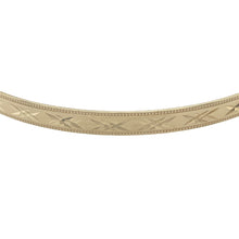 Load image into Gallery viewer, Bring classic elegance and refined texture to your collection with this pre-owned 9ct yellow solid gold patterned bangle, offering timeless detail and a graceful finish — perfect for everyday sophistication or special occasion wear.

Design: This elegant bangle features a 4mm width with intricate patterning, adding subtle texture and visual interest to its sleek, polished form.
Material: Made from solid 9-carat yellow gold, the radiant finish enhances its rich golden hue
