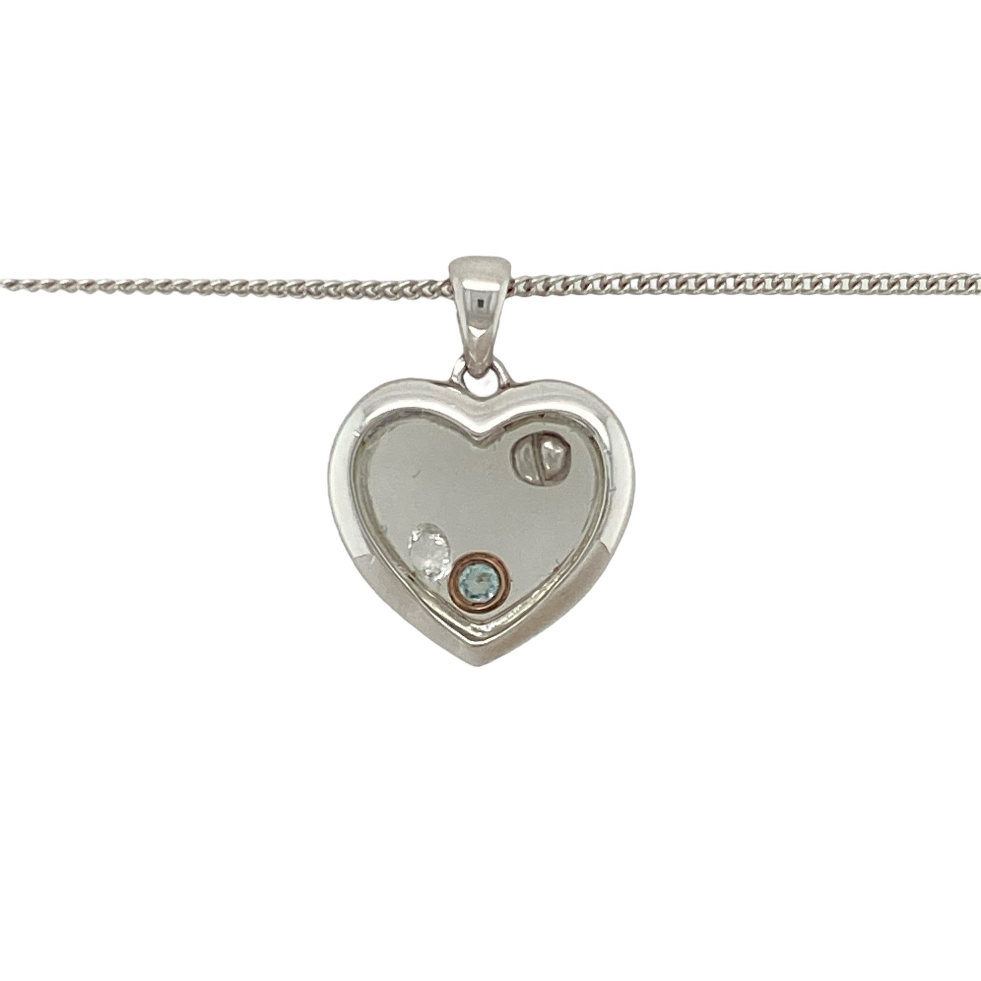 Bring romantic elegance and sparkling detail to your jewellery collection with this pre-owned 925 silver and 9ct rose gold Clogau heart pendant necklace, encased with gemstones and suspended on an adjustable chain—perfect for heartfelt gifting or timeless everyday wear.

Design: The pendant measures 2.1cm in length including the bail and features a polished heart design in silver, delicately encased with gemstones and accented with warm 9ct rose gold for a radiant and graceful finish.
