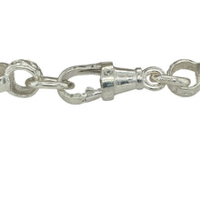 Load image into Gallery viewer, Add a touch of sparkle and charm to any little one’s collection with this new 925 silver cubic zirconia double heart belcher bracelet, a sweet design with meaningful detail.

Design: The bracelet features two interlinked hearts measuring 23mm by 13mm, accented with cubic zirconia for extra sparkle, and alternating engraved links for added character.
Material: Made from 925 sterling silver, the polished finish enhances the shine of the silver and the brilliance of the stones.

