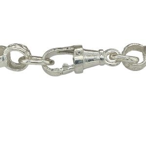 Add a touch of sparkle and charm to any little one’s collection with this new 925 silver cubic zirconia double heart belcher bracelet, a sweet design with meaningful detail.

Design: The bracelet features two interlinked hearts measuring 23mm by 13mm, accented with cubic zirconia for extra sparkle, and alternating engraved links for added character.
Material: Made from 925 sterling silver, the polished finish enhances the shine of the silver and the brilliance of the stones.
