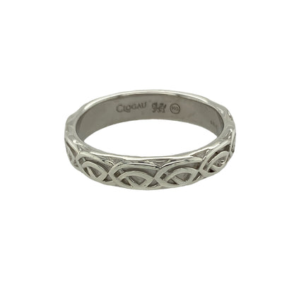 Bring timeless symbolism and elegant detail to your collection with this pre-owned Clogau Celtic Knot band ring in silver and 9ct rose gold, a meaningful design inspired by heritage and tradition.

Design: The ring features a 4mm wide band decorated with an intricate Celtic knot motif, highlighted with 9ct rose gold accents for a refined two-tone finish.
Material: Made from 925 sterling silver with 9-carat rose gold detail, the polished surface enhances the knotwork design and warm contrast.
