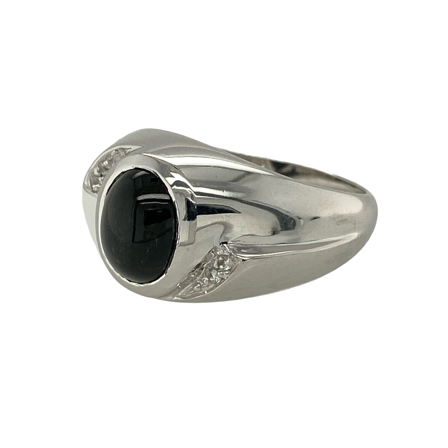 Bring celestial charm and refined sparkle to your jewellery collection with this pre-owned 9ct white gold star sillimanite and white topaz set ring.

Design: The ring features an oval star sillimanite at the centre, measuring approximately 9mm by 7mm, displaying a subtle star effect, with white topaz stones accenting the design for added brilliance.
Material: Made from 9-carat white gold, the bright polished finish enhances the unique character of the sillimanite and the sparkle of the white topaz.