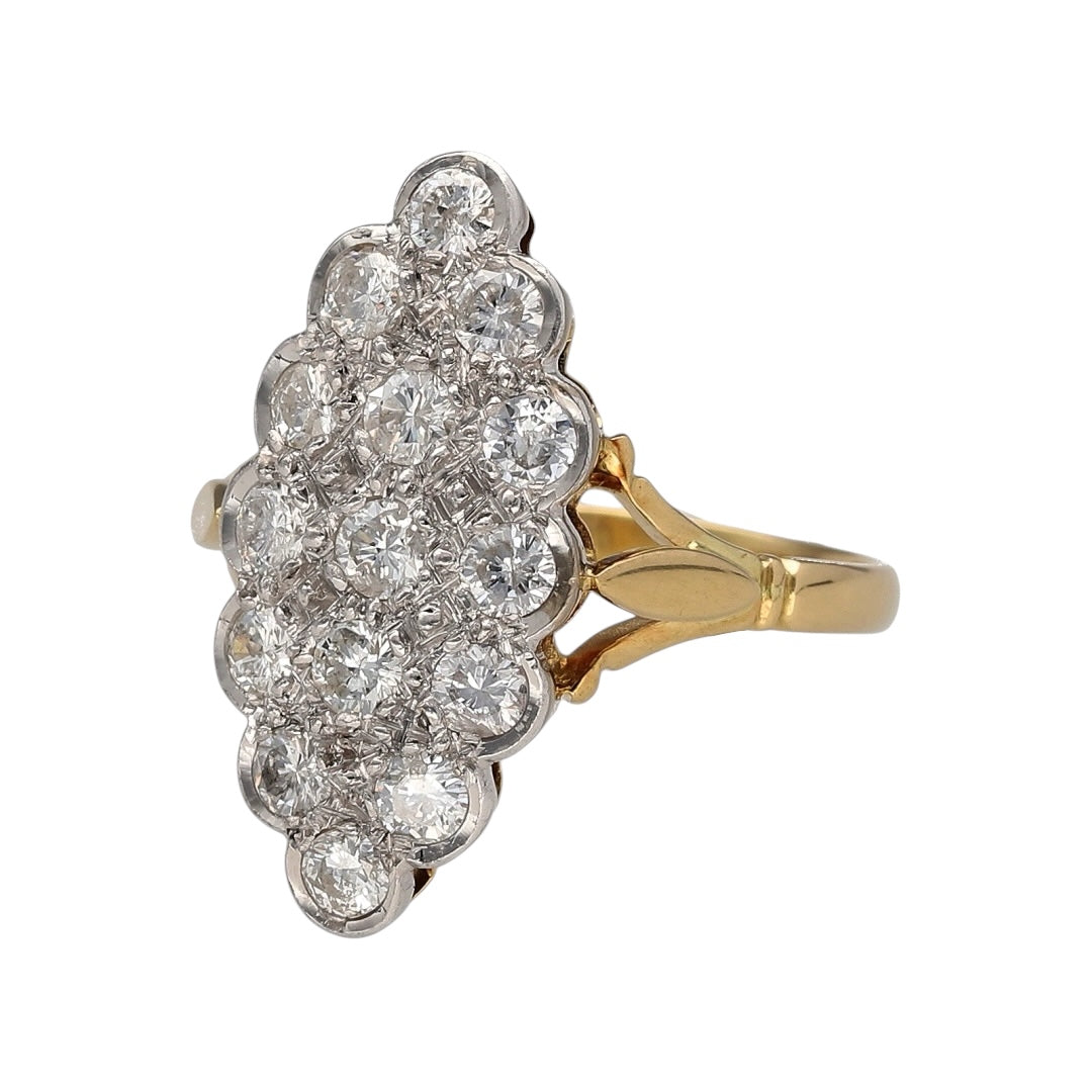 This pre-owned 18ct yellow gold diamond vintage navette cluster ring is a distinctive statement piece, featuring fifteen old cut diamonds in an elongated marquise-shaped setting.

Design: Featuring a vintage navette-style cluster with an elongated marquise shape, this ring is set with fifteen old cut diamonds in a contrasting white gold setting. The front measures approximately 2.4cm high, creating an eye-catching statement design with plenty of vintage character.