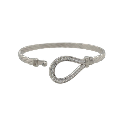 Bring charm and sparkle to your collection with this new 925 silver cubic zirconia children’s horseshoe bangle, a sweet design symbolising luck and happiness.

Design: The bangle features a 15mm high front with a classic horseshoe motif, beautifully accented with sparkling cubic zirconia stones for a touch of brilliance.
Material: Made from solid 925 sterling silver, the polished finish enhances the shine and gives the piece a bright, elegant appearance.