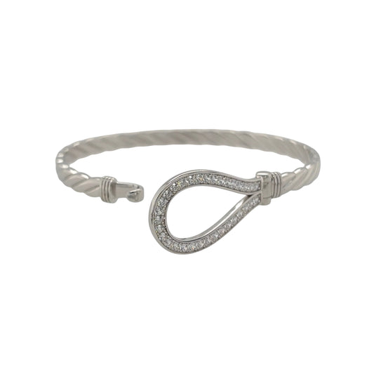 Bring charm and sparkle to your collection with this new 925 silver cubic zirconia children’s horseshoe bangle, a sweet design symbolising luck and happiness.

Design: The bangle features a 15mm high front with a classic horseshoe motif, beautifully accented with sparkling cubic zirconia stones for a touch of brilliance.
Material: Made from solid 925 sterling silver, the polished finish enhances the shine and gives the piece a bright, elegant appearance.