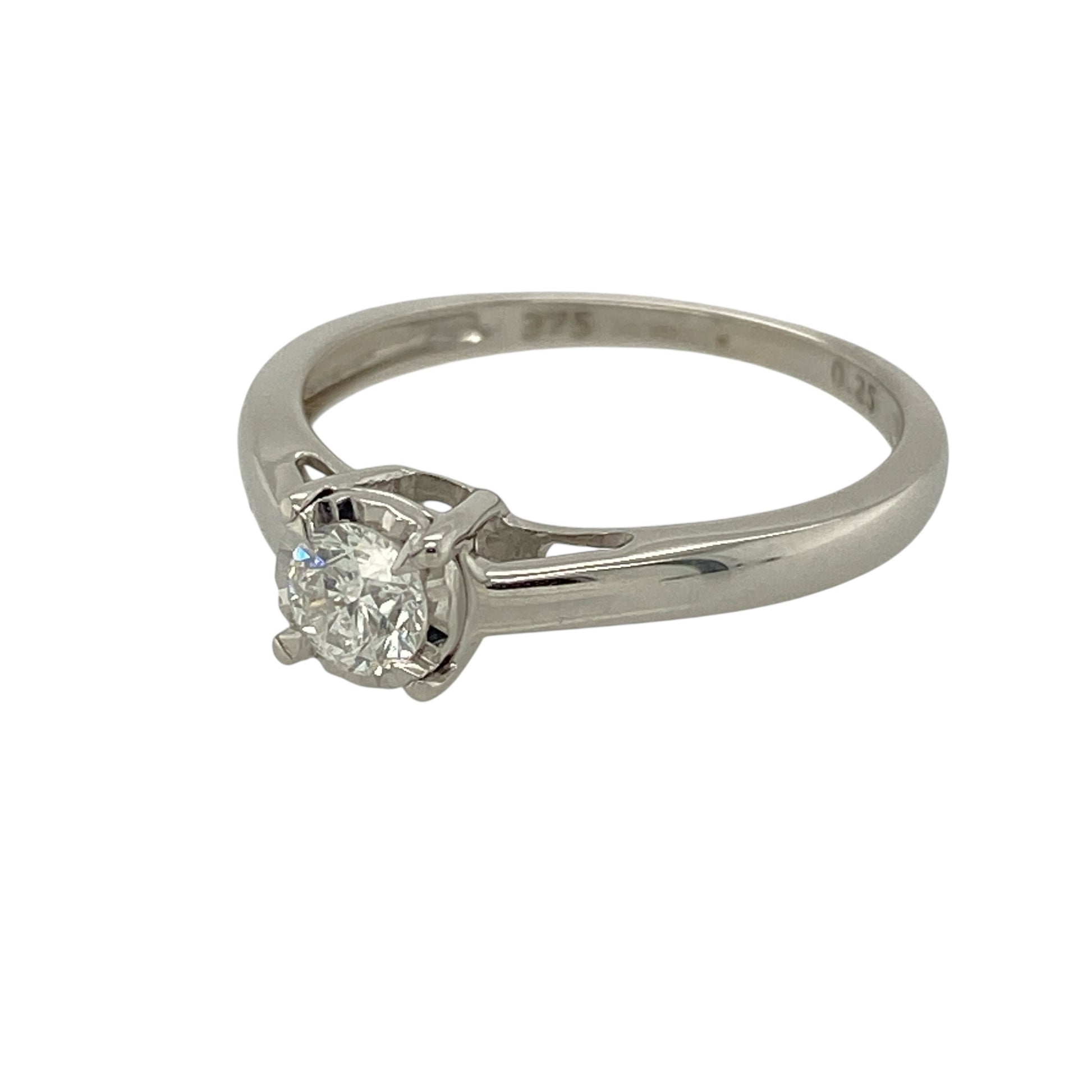 Bring classic elegance and refined sparkle to your jewellery collection with this pre-owned 9ct white gold diamond set solitaire ring, offering a timeless design with enhanced brilliance—perfect for everyday wear or special occasions.

Design: The ring features an illusion-set brilliant cut diamond at the centre, approximately 0.25ct, designed to maximise sparkle and create the appearance of a larger stone.