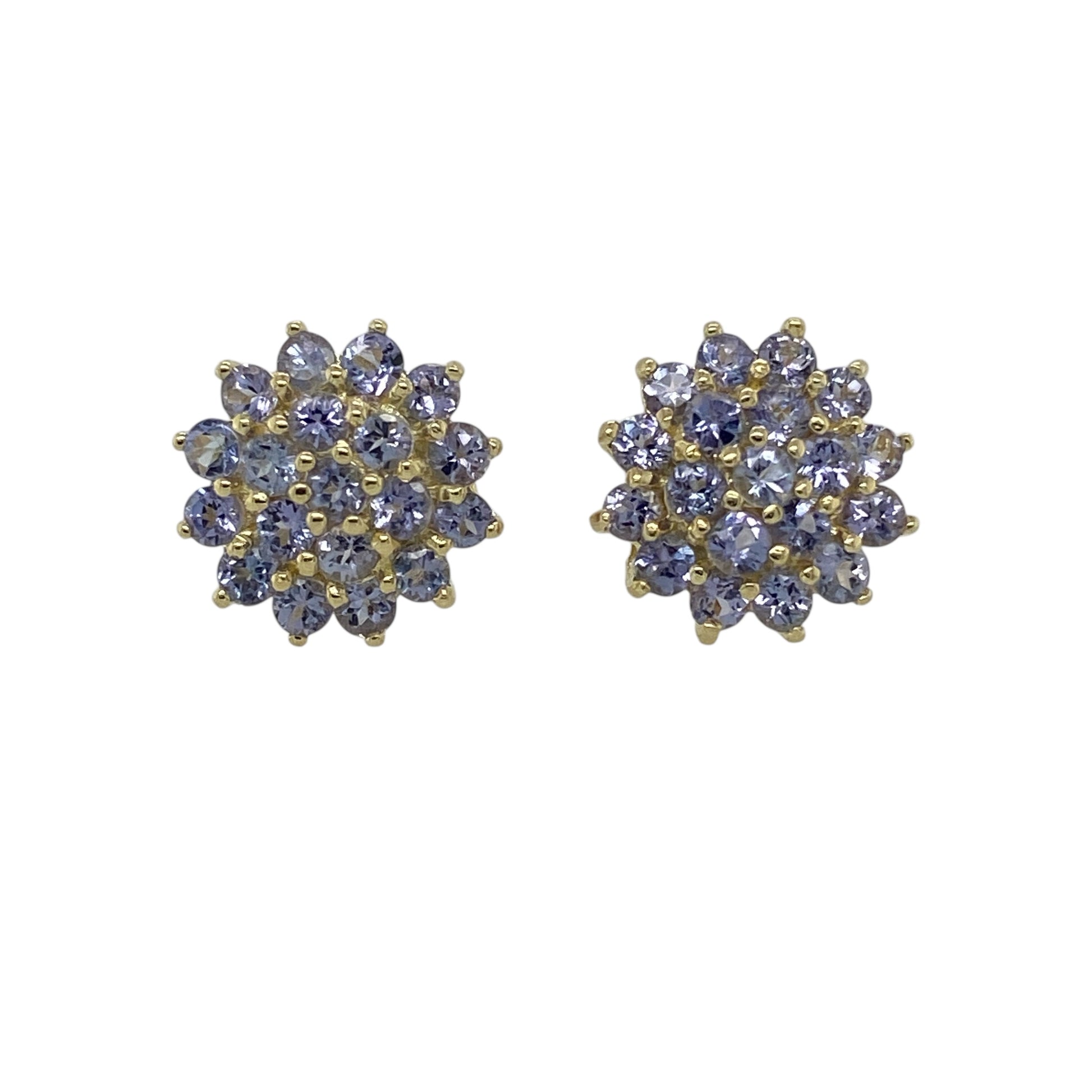 Bring rich colour and elegant sparkle to your jewellery collection with these pre-owned 9ct yellow gold tanzanite set cluster stud earrings, offering a refined design with timeless appeal—perfect for everyday wear or special occasions.

Design: The earrings feature a cluster arrangement of tanzanite stones, creating a vivid and eye-catching focal point with beautiful balance.