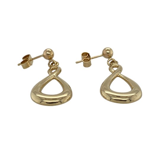 Bring elegant movement and timeless design to your jewellery collection with these pre-owned 9ct yellow gold twist loop drop earrings, offering a refined look with graceful flow—perfect for everyday wear or special occasions.

Design: The earrings feature a twist loop drop design, creating a fluid and eye-catching silhouette that adds subtle movement and visual interest.
Material: Made from 9-carat yellow gold, the polished finish enhances the warm golden tone and highlights the twisted detailing.