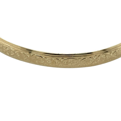 Bring meaningful heritage style and delicate charm to your jewellery collection with this pre-owned 9ct yellow gold Celtic patterned expanding baby bangle, offering a timeless design with thoughtful detailing—perfect as a treasured keepsake or gift.

Design: The bangle features a classic Celtic patterned finish, adding traditional character and decorative appeal. The band measures approximately 4mm in width, giving it a neat and refined profile.