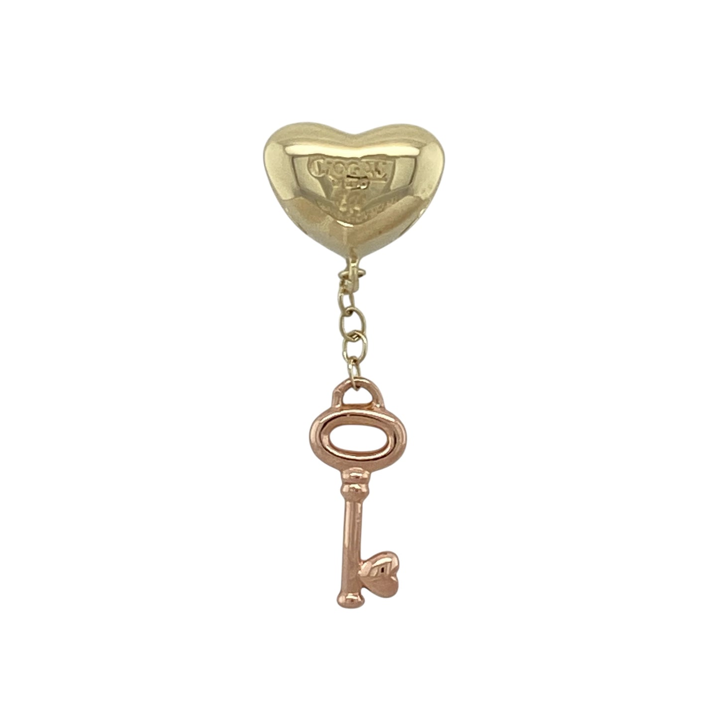 Bring romantic symbolism and Welsh heritage style to your jewellery collection with this pre-owned 9ct yellow and rose gold Clogau bead heart key charm, offering meaningful design with elegant two-tone detail—perfect for adding sentiment to your charm bracelet.

Design: The charm features a heart and key motif, symbolising love, trust, and new beginnings, presented in a refined bead-style design with charming detail.