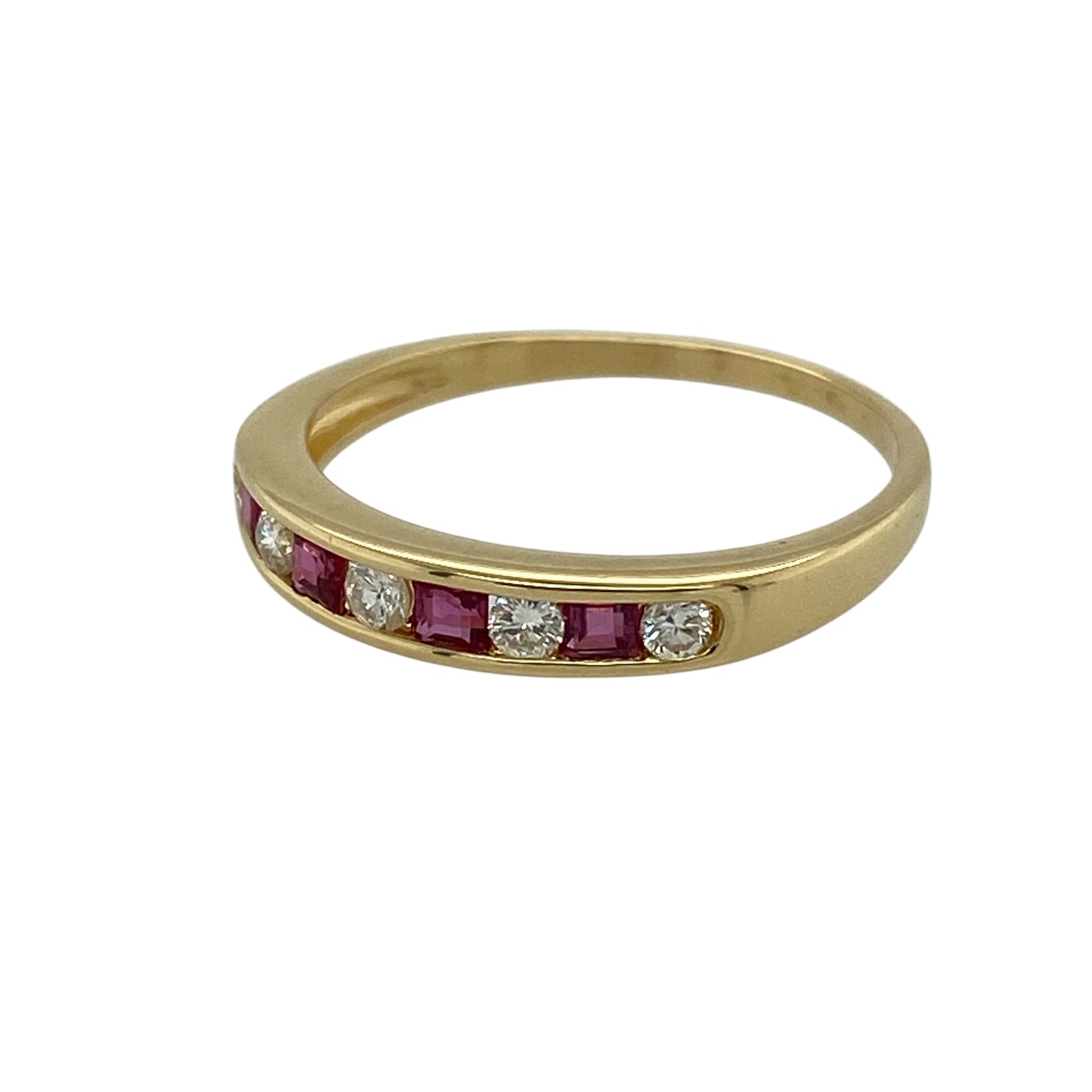 Bring rich colour and refined sparkle to your jewellery collection with this pre-owned 18ct yellow gold diamond and ruby set band ring, offering a timeless design with elegant contrast—perfect for everyday wear or special occasions.

Design: The ring features a classic band style accented with ruby and diamond detailing across the front, which measures approximately 3mm in width for a sleek and balanced profile.