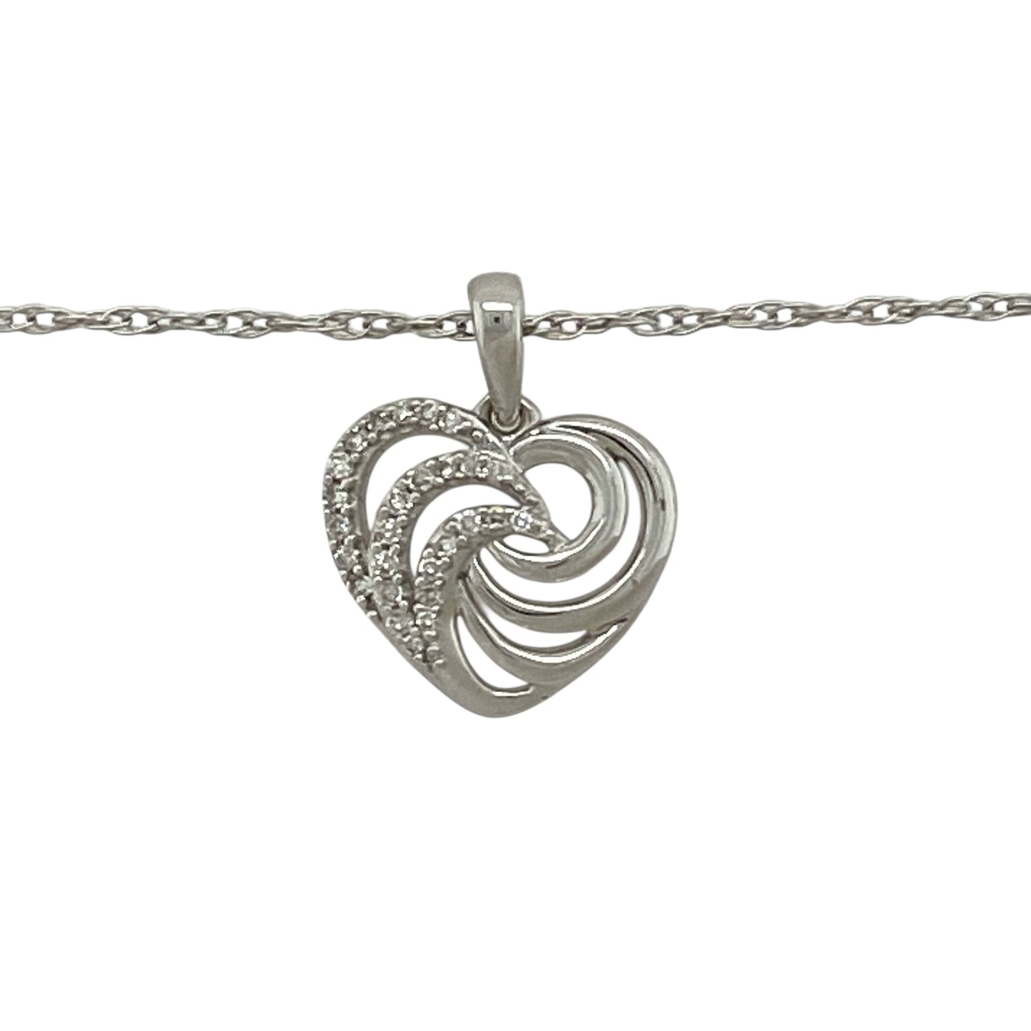 Bring romantic elegance and gentle sparkle to your jewellery collection with this pre-owned 9ct white gold diamond set swirl heart pendant necklace, offering a graceful design with timeless appeal—perfect for everyday wear or meaningful gifting.

Design: The pendant features a swirl-style heart design accented with diamonds, creating a flowing and elegant look. The pendant measures approximately 1.6cm in length including the bail, giving it a delicate yet noticeable presence.
