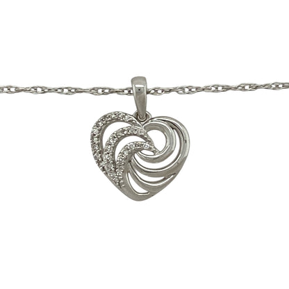 Bring romantic elegance and gentle sparkle to your jewellery collection with this pre-owned 9ct white gold diamond set swirl heart pendant necklace, offering a graceful design with timeless appeal—perfect for everyday wear or meaningful gifting.

Design: The pendant features a swirl-style heart design accented with diamonds, creating a flowing and elegant look. The pendant measures approximately 1.6cm in length including the bail, giving it a delicate yet noticeable presence.