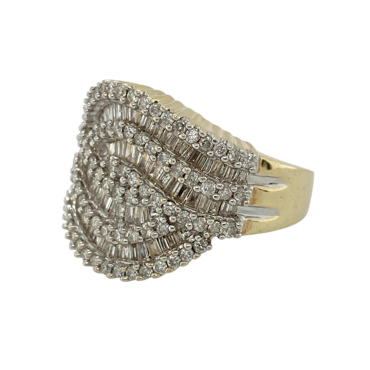 Bring bold luxury and dazzling sparkle to your jewellery collection with this pre-owned 9ct yellow gold and diamond set wavy multi-row wide band ring, showcasing an eye-catching design with impressive diamond detail—perfect for making a statement.

Design: The ring features a striking wavy multi-row front measuring approximately 18mm in height, adorned with a combination of brilliant-cut and baguette-cut diamonds that create depth, texture, and exceptional visual impact.